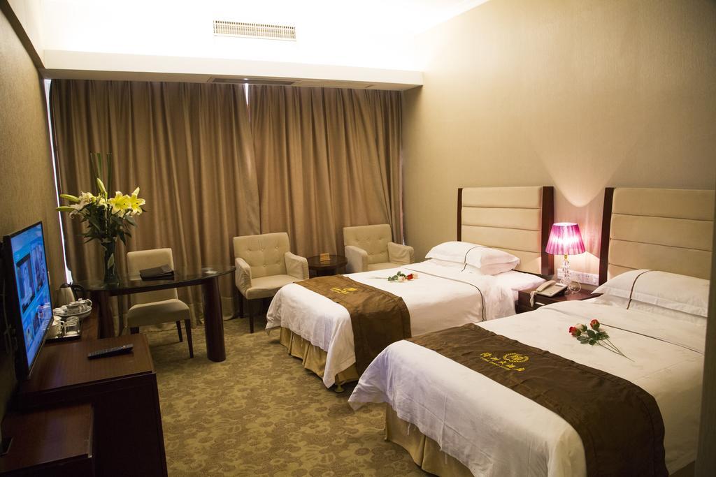 Long Zhou Grand Hotel Guangzhou Room photo