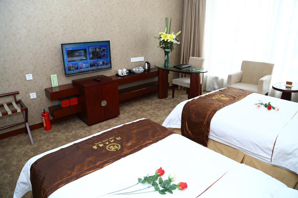 Long Zhou Grand Hotel Guangzhou Room photo